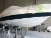 Bayliner 205 perched on stands during curing time.