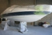 Bayliner 205 on hard stands preparation for hull repairs and respray Bayliner 205 on hard stands preparation for hull repairs and respray