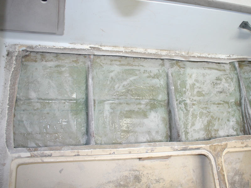 Glassing over of the re enforced hull lateral stringers